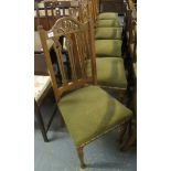 Set of six oak Art Nouveau design carved dining chairs with stuff over seats on turned tapering