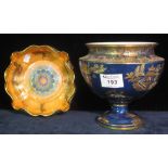 Early Carlton Ware urn shaped pedestal bowl on a cobalt blue ground with gilded oriental pagodas and