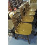 Set of four beech Ercol style spindle back kitchen chairs, unmarked. (4) (B.P. 24% incl. VAT)