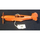 A diecast model metal fighter aircraft fuselage (possibly a Curtiss Kittyhawk), lacking wings. (B.P.