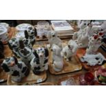 Collection of 19th Century/early 20th Century Staffordshire fireside poodles, some with open cast