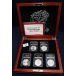 A complete cased set of American silver eagle dollars, in display box with plastic cases. (B.P.