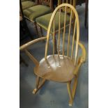 Beech and elm Ercol spindle and hoop back rocking armchair. (B.P. 24% incl. VAT)