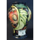 Modern Moorcroft art pottery tube lined baluster vase, 'Queen's Choice' overall decorated with