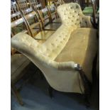 Victorian upholstered button back double ended sofa on a mahogany frame with serpentine front,