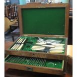 Early 20th Century oak cased canteen of cutlery with two pull out drawers. (B.P. 24% incl. VAT)