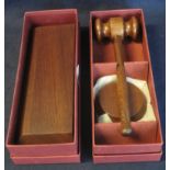 Modern mahogany gavel with small block, together with matching rectangular block, in original boxes.