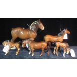 Large Beswick Shire horse, together with four other bay Beswick horses. (5) (B.P. 24% incl. VAT)