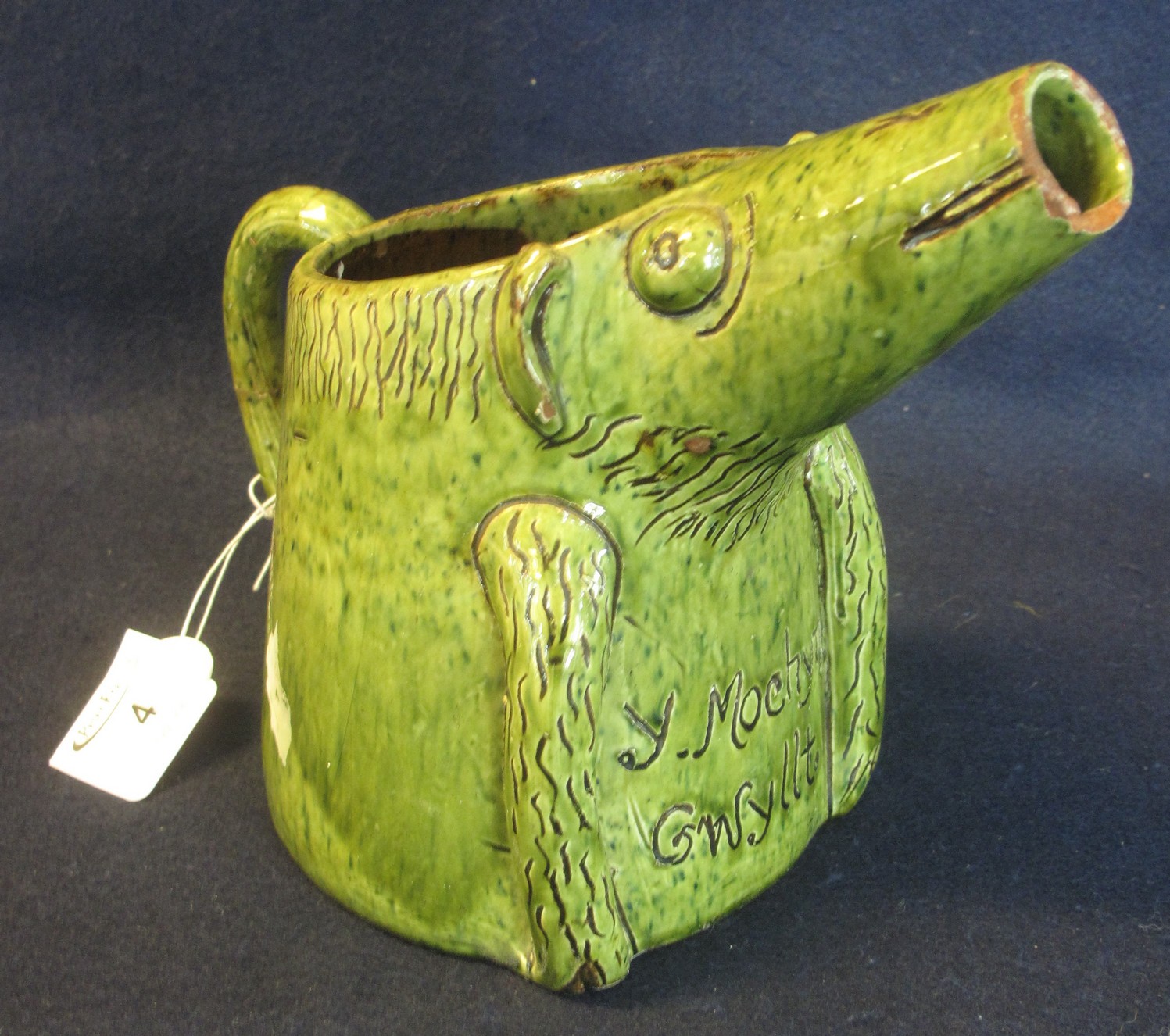 Ewenny pottery green slip glazed wild pig single handled jug, 'Y Mochyn Gwyllt', marked to the