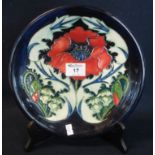 Modern Moorcroft art pottery tube lined poppy design cabinet plate or charger. 26cm diameter approx.