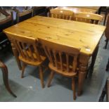 Small modern pine kitchen table, together with a set of four matching pine spindle kitchen