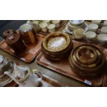 Two trays of modern treen items various to include; various jars and covers, graduated fruit