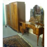 Early 20th Century mahogany bedroom suite comprising larger and smaller wardrobes, bedside cabinet