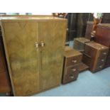 Art Deco design walnut part bedroom suite to include; mirror back dressing table and low two door