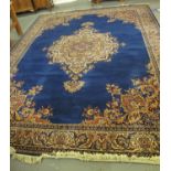 Modern Persian design Kandahar foliate carpet on a blue ground. 3.7 x 2.7m in size approx. (B.P. 24%