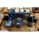 Tray of Torquay pottery Lemon and Crute design items on a blue ground with iris flowers to