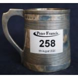 Silver reeded christening tankard with inscription dated 1863. Birmingham hallmarks. 2.9 troy ozs