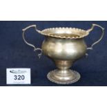 Silver baluster shaped two handled pedestal vase. London hallmarks. 3.5 troy ozs approx. (B.P. 24%