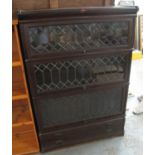 Early 20th Century oak Kenrick & Jefferson three section lead glazed bookcase. (B.P. 24% incl. VAT)