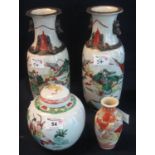 Pair of Chinese crackle glazed vases painted with continual designs of fighting figures, together