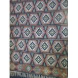 Unusual large multi-coloured geometrically embroidered crewel work wall hanging. (B.P. 24% incl.