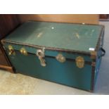 Vintage canvas and metal banded trunk with carrying handles. (B.P. 24% incl. VAT)