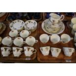 Tray of Royal Standard fine bone china teaware on a white ground with gilded and floral sprays.