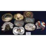 Box of assorted American style belt buckles, various including; horses heads, John Wayne, native