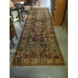 Middle Eastern design hand woven runner, the central rectangular panel decorated with stylised