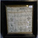 19th Century needlework sampler with alphabet, geometric bands, motifs and religious text.