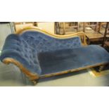 Victorian upholstered button back chaise longue with carved decoration on turned supports. (B.P. 24%