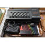 Three Sinclair 128K ZX Spectrum + 3 computers and a power cable or controller and books. (B.P. 24%