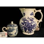 Coughley mask jug decorated in flower and fruit pattern, together with a Coughley custard cup and