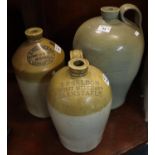 Three stoneware flagons to include; 'W.S Phillips & Co Carmarthen' and 'T.P Seldon, spirit