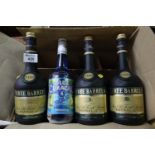 Three bottles of Three Barrels rare old French brandy. 70cl. Together with a bottle of Blue Curacao.