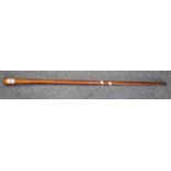 Hardwood walking cane with inlaid band. (B.P. 24% incl. VAT)