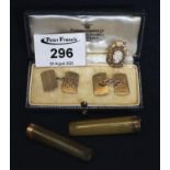 Cased pair of gold rectangular engine turned chain linked cufflinks with Pleasants & Harper Ltd of