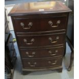 20th Century mahogany bow front chest of three drawers, of narrow proportions on bracket feet. (B.P.