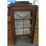 Edwardian mahogany inlaid single door glazed display cabinet on square tapering legs. (B.P. 24%