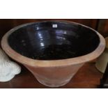 Large Welsh terracotta dairy pan. 63cm diameter approx. (B.P. 24% incl. VAT)