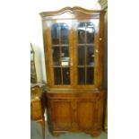 Good quality walnut corner cabinet with shaped shelves. (B.P. 24% incl. VAT)