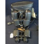 Pair of Skybolt 8 x 30 binoculars in leather case, together with pair of Boots Ascot 10 x 50