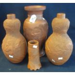 A group of four Japanese Tokoname red ware earthenware vases to include; near pair of double gourd