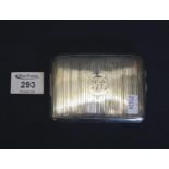 Large engine turned silver rectangular cigarette case with engraved initials and presentation text