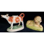 Ceramic cow creamer on a naturalistic oval base, together with a ceramic study of a recumbent