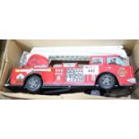 Japanese tin plate battery operated fire engine 'Mystery action' in original box. (B.P. 24% incl.