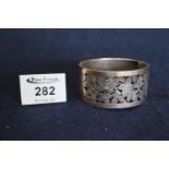 Victorian white metal wide pierced and engraved bangle. (B.P. 24% incl. VAT)