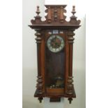 Early 20th Century walnut two train Vienna type wall clock with pendulum and key. (B.P. 24% incl.