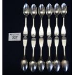 Set of eight fiddle and thread design white metal continental teaspoons with crowned initials,