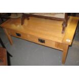Modern pale oak two drawer coffee table on square supports. (B.P. 24% incl. VAT)